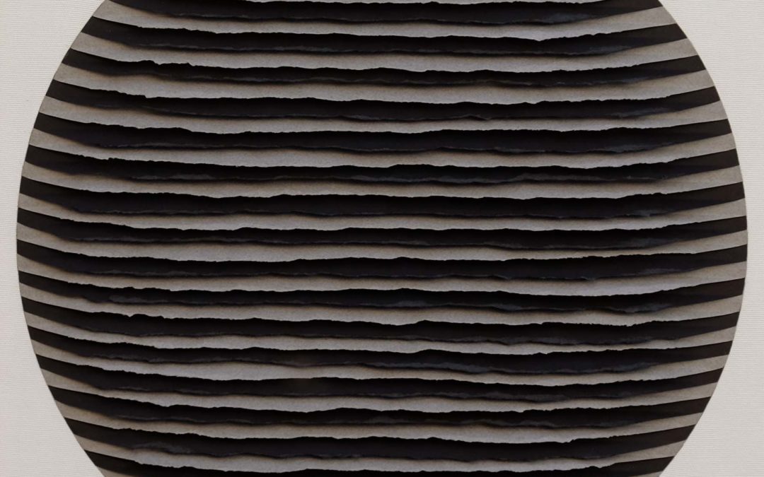 Black and gray striped circle