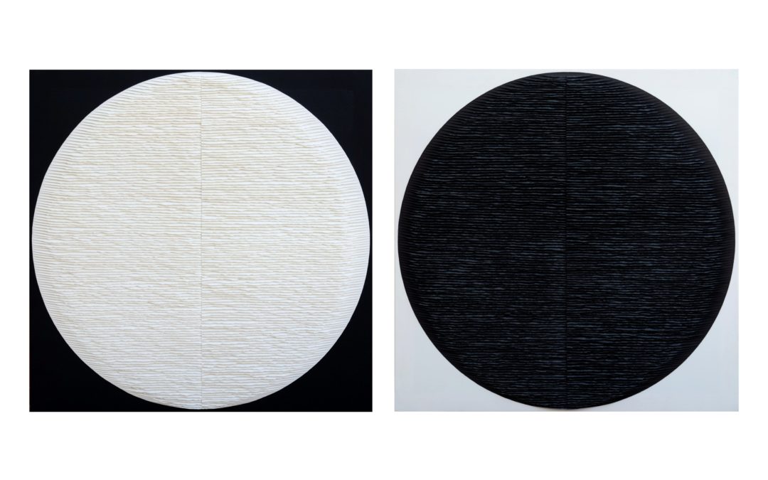 Diptych. Black and white circles on inverted background