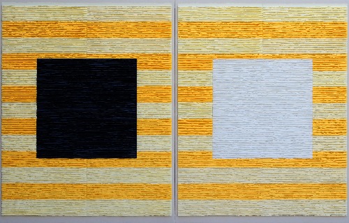 Black and white squares on striped background